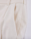 Lettering jacquard pleated skirt - Cream